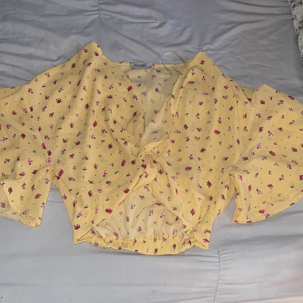 Cute yellow floral crop top size medium fits amazing .